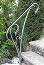 An Art Nouveau inspired handrail that is almost sculptural