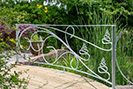 Creative and flowing railings guarding a pond
