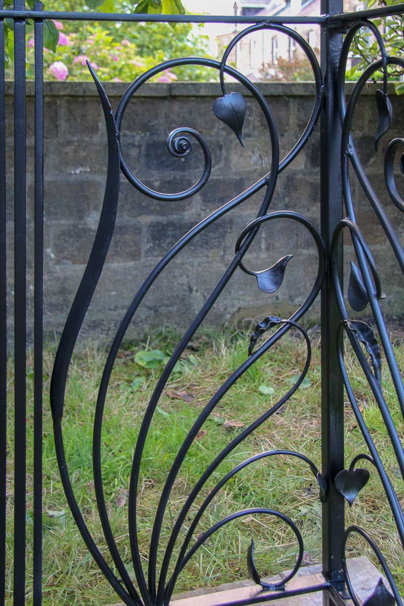 Bespoke handmade railings with leaves and tendrils 