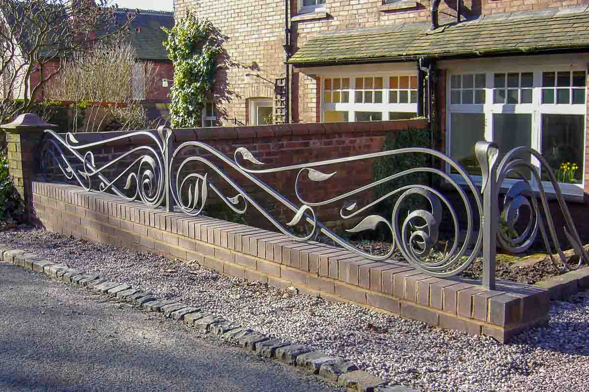 Sweeping and flowing Wrought Iron Railings 