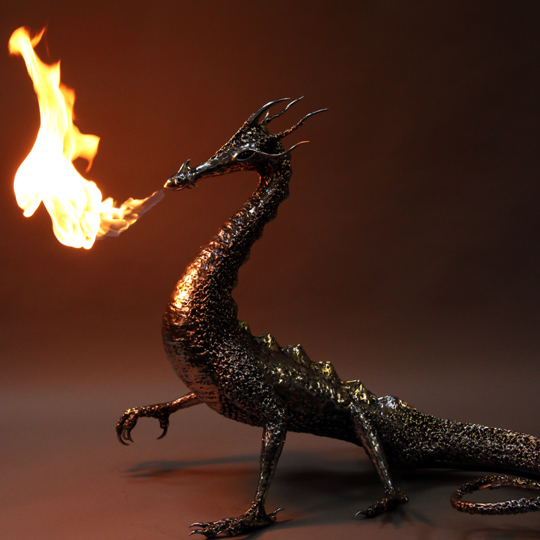 fire breathing bronze and stainless steel dragon sculpture