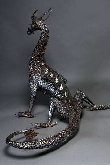 The dragon sculpture is a rich blend of tone, texture and detailing