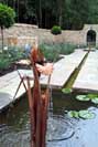 forged copper iris water feature