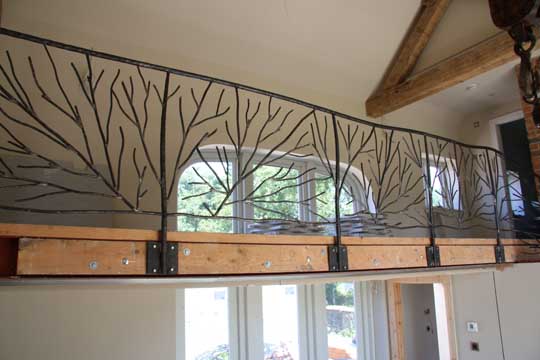 Abstract tree sculpture metal railings