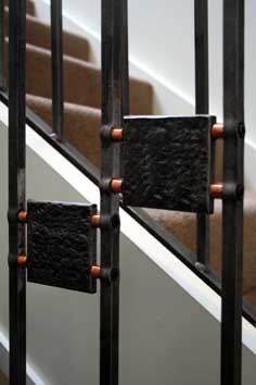 copper and steel stair railing detailing