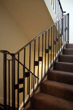 textured steel and copper stair railings