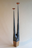 Forged and tapered candlesticks