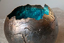 Bronze bowl with vibrant blue patina inside