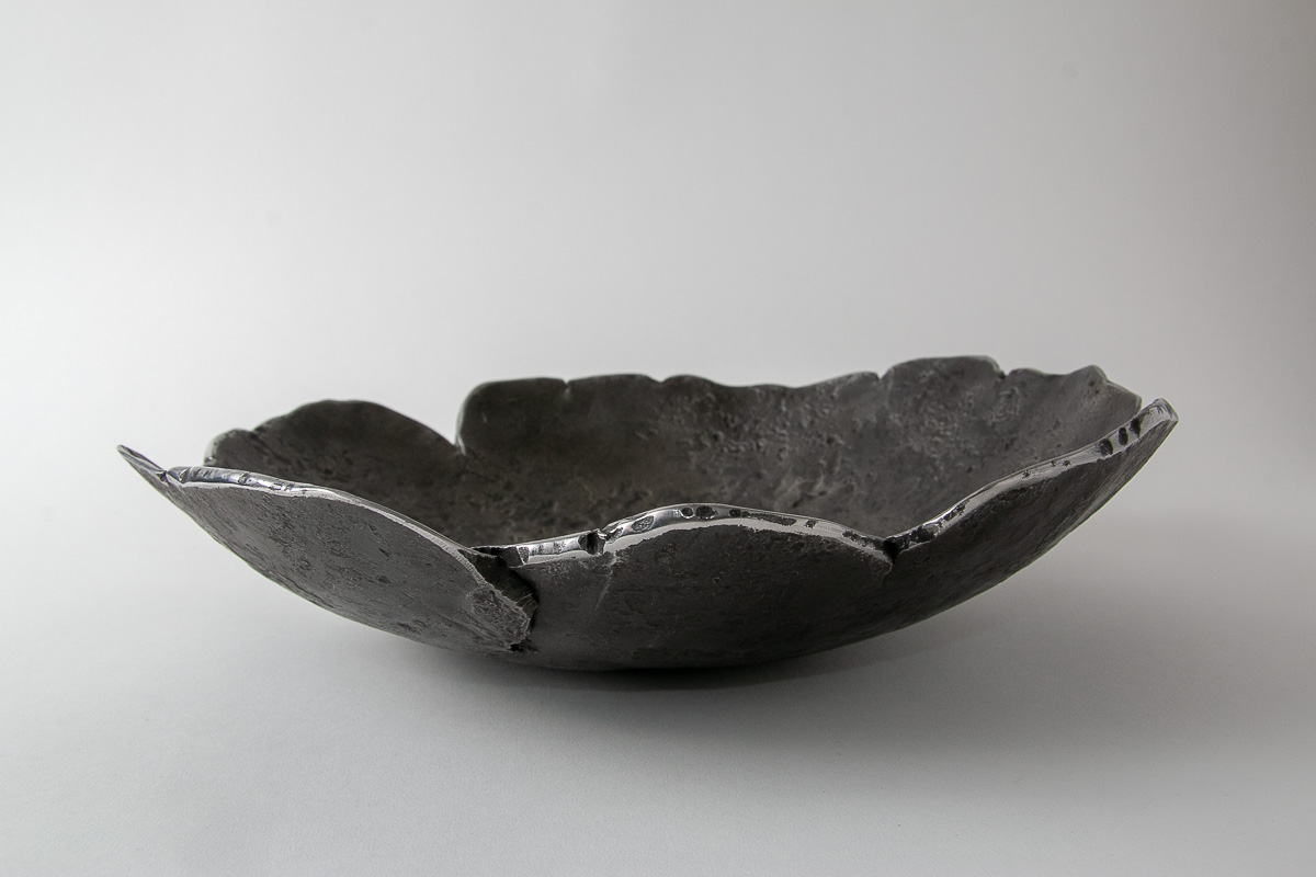 Forged and textured iron bowl 