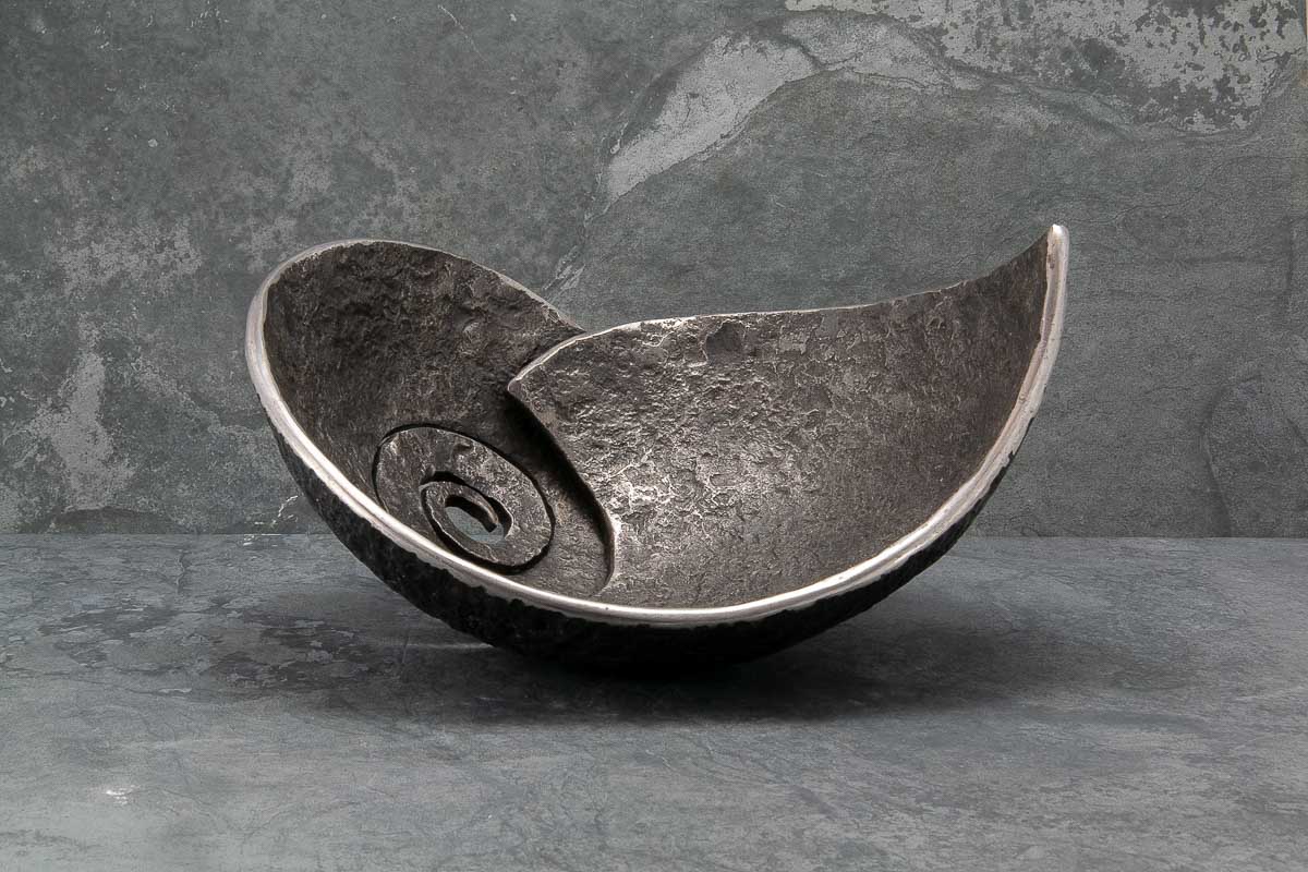 Unique and individual textured iron bowl 