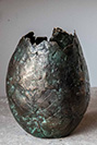Sculptural bronze bowl with aged texture and patina