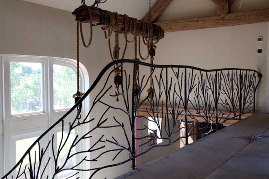The stair railings were based around abstract tree sculptures