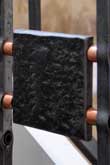Textured steel panel in a set of steel railings