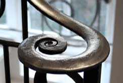 Burnished and waxed handrail volute