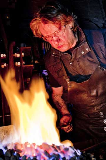 David Hyde working at a coal forge